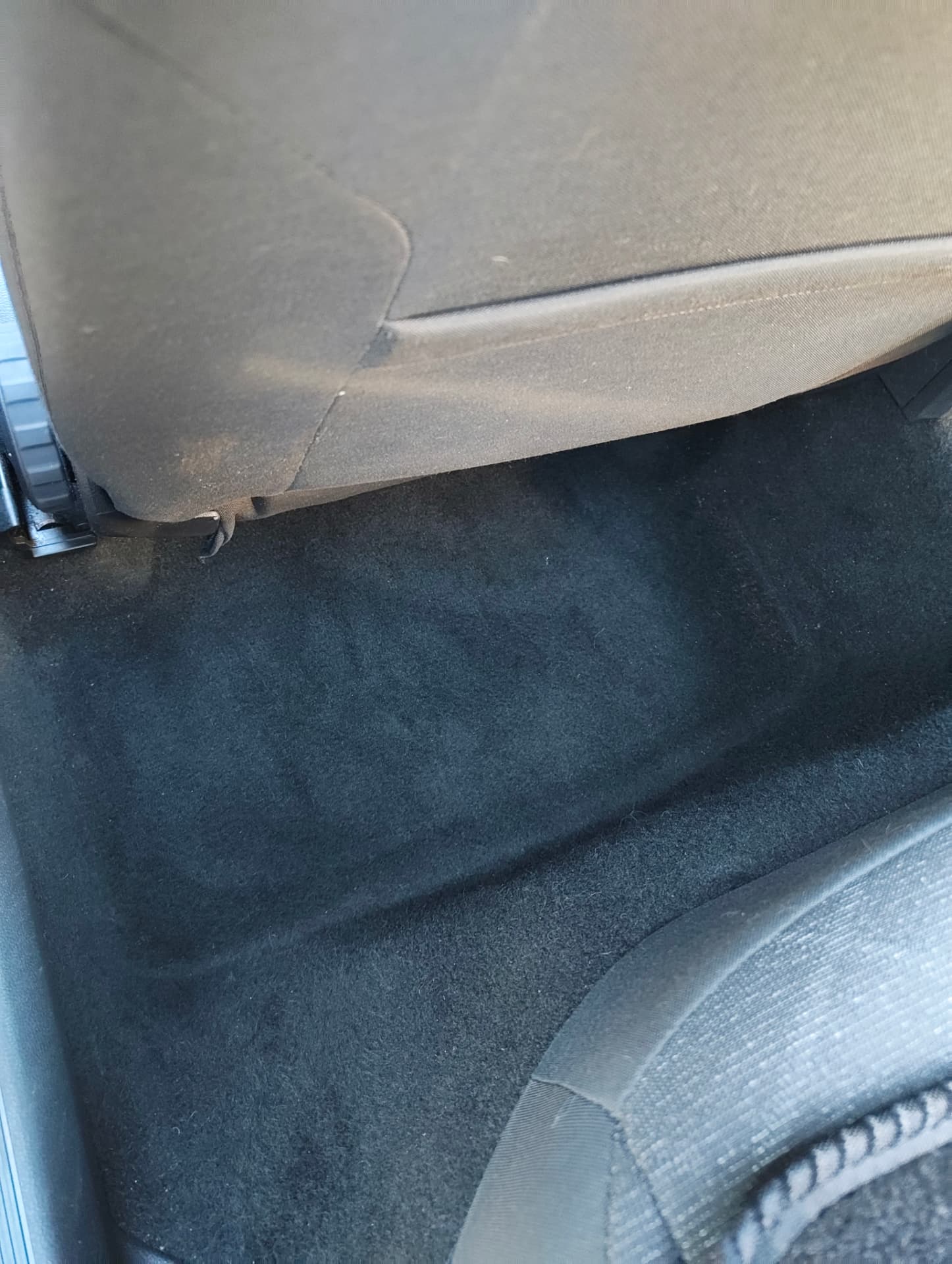 Golf rear footwell carpet clean with fresh vacuum lines after extraction