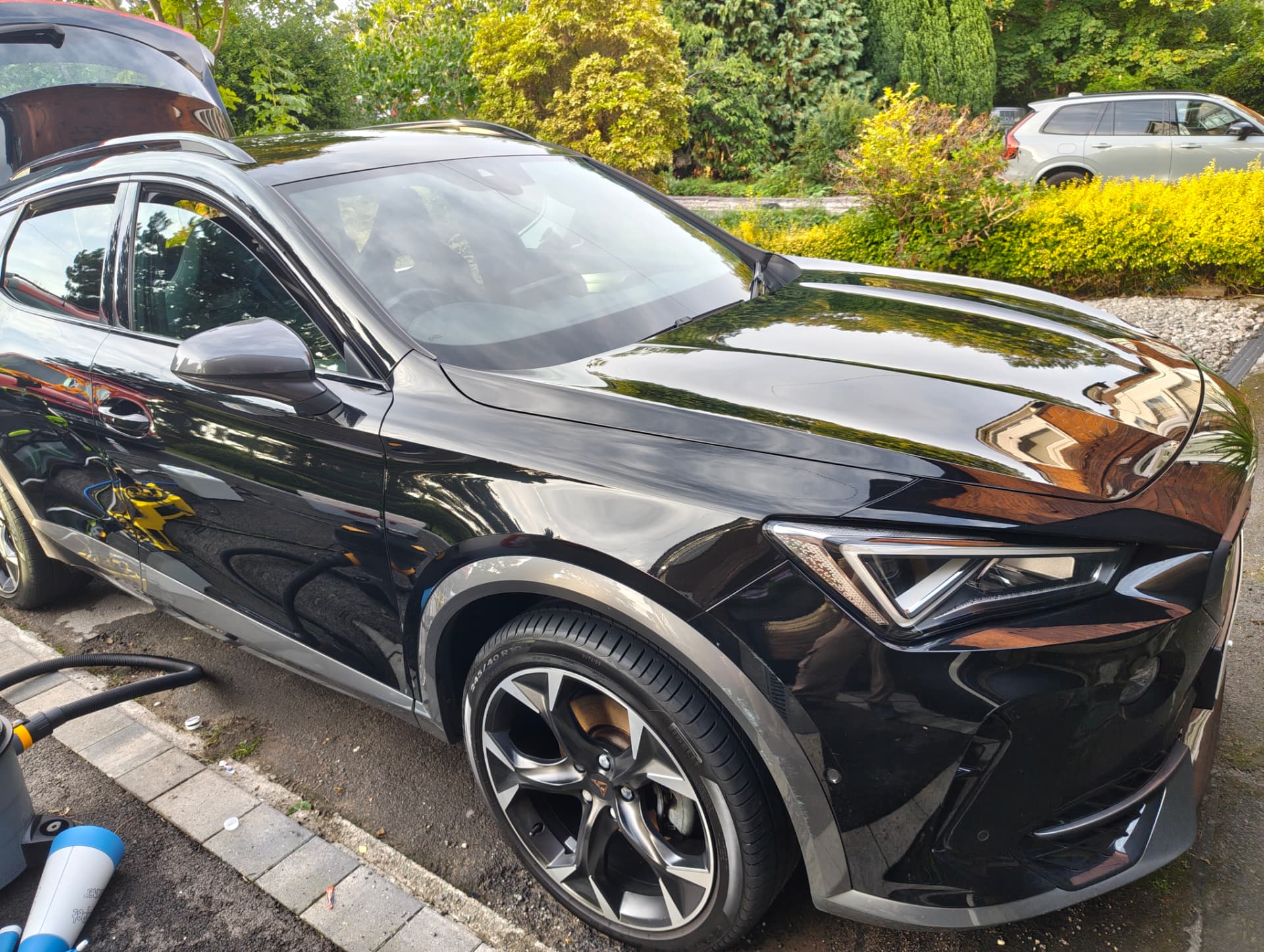The same Cupra with a mirror-like gloss after paint correction