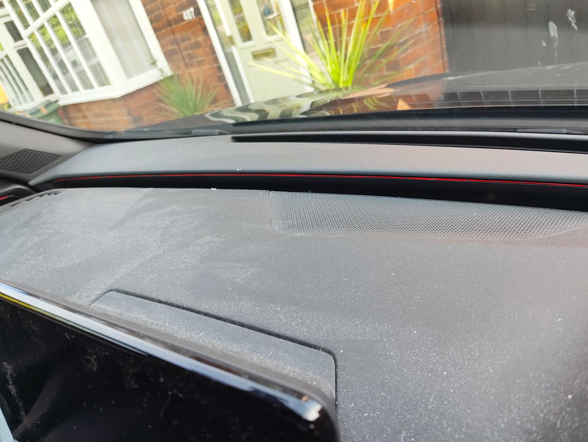 Cupra dashboard covered in dust before interior detail