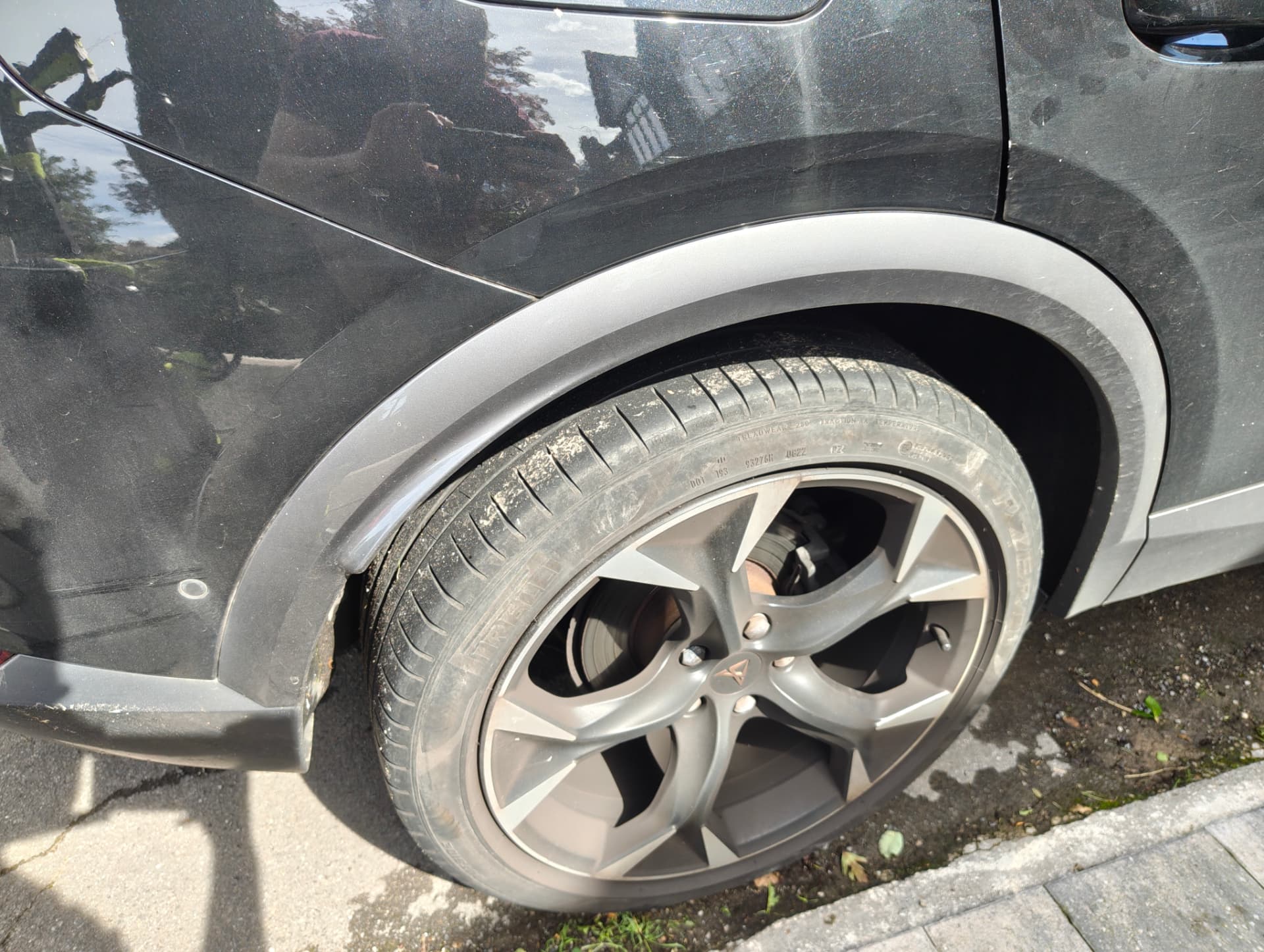 Cupra front alloy wheel with brake dust and road grime before cleaning