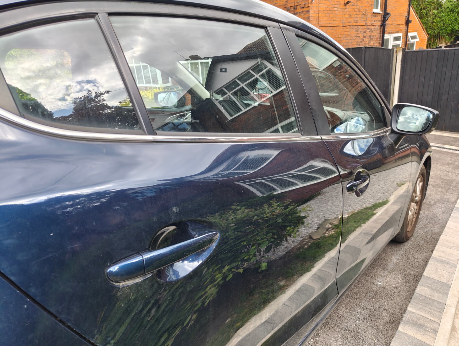 Vehicle side paintwork recorded before correction